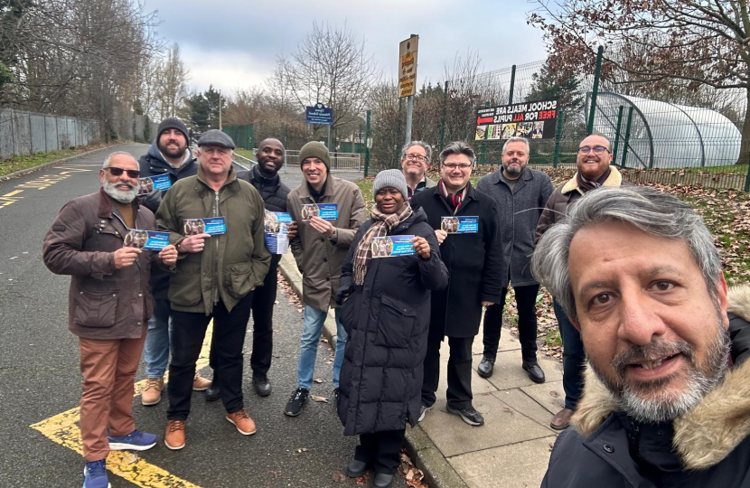 A group of conservative voters gather together smiling at the camera